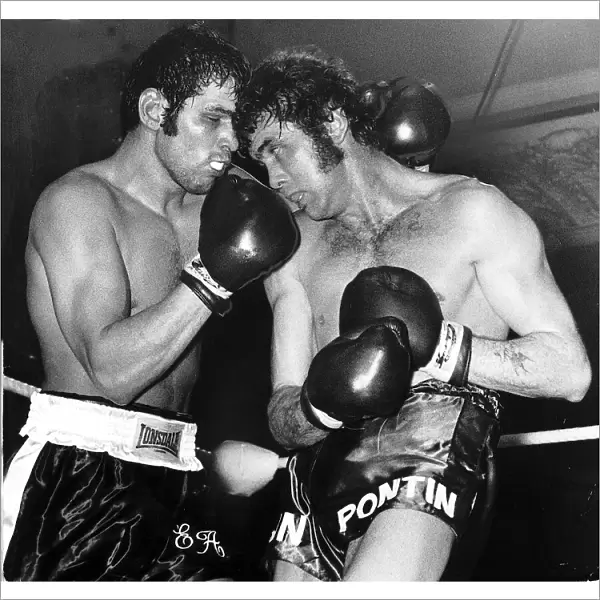 Boxing, punishing moment as Chris Finnegan (right) corners Eddie Avoth