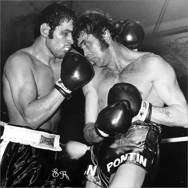 Boxing, punishing moment as Chris Finnegan (right) corners Eddie Avoth