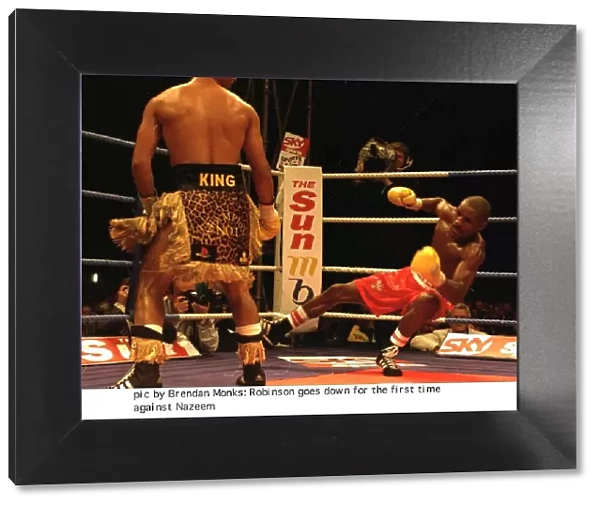 Steve Robinson hits the canvas floored by Prince Naseem Hamed during WBO featherweight