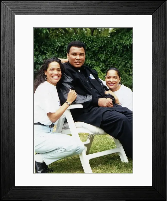 Framed Print : Boxer Muhammad Ali (Cassius Clay) with daughters. August 1992 Framed Print : Boxer Muhammad Ali (Cassius Clay) with daughters. August 1992