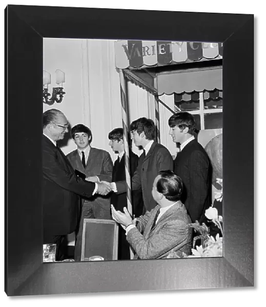 The Beatles attend the Variety Club Lunch. Left to right: Paul McCartney