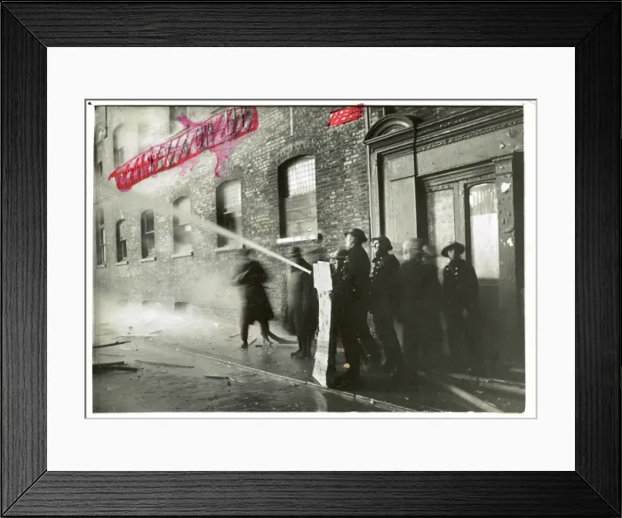 Framed Print : London suffered its second fire blitz last night - our picture shows the fire fighters