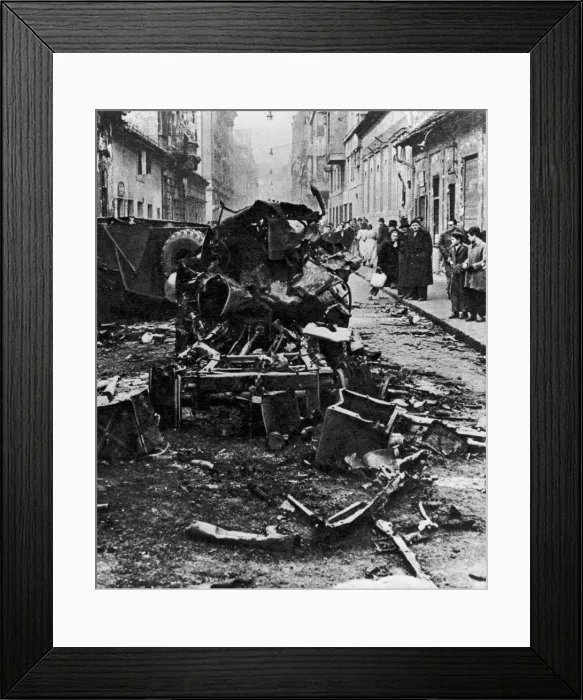 Framed Print : Hungarian Revolt 1956. Onlookers inspect the tangled wreckage of an unidentified vehicle
