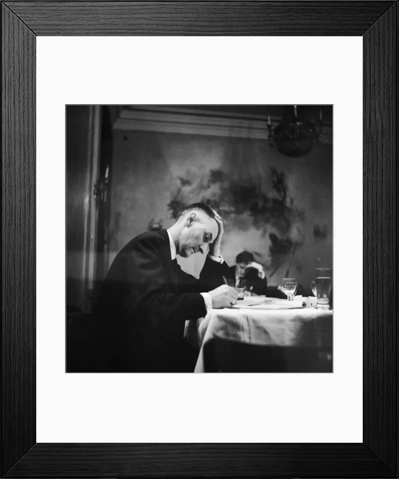 Framed Print : Hungarian Revolution. An unidentified Hungarian man writing at a table in a restaurant Framed Print : Hungarian Revolution. An unidentified Hungarian man writing at a table in a restaurant