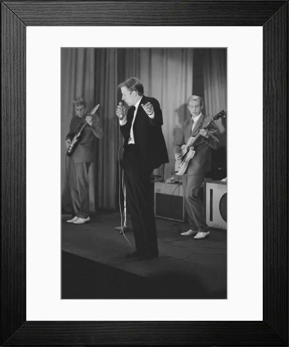 Framed Print : British pop singer Mike Sarne performing on stage with his band Framed Print : British pop singer Mike Sarne performing on stage with his band
