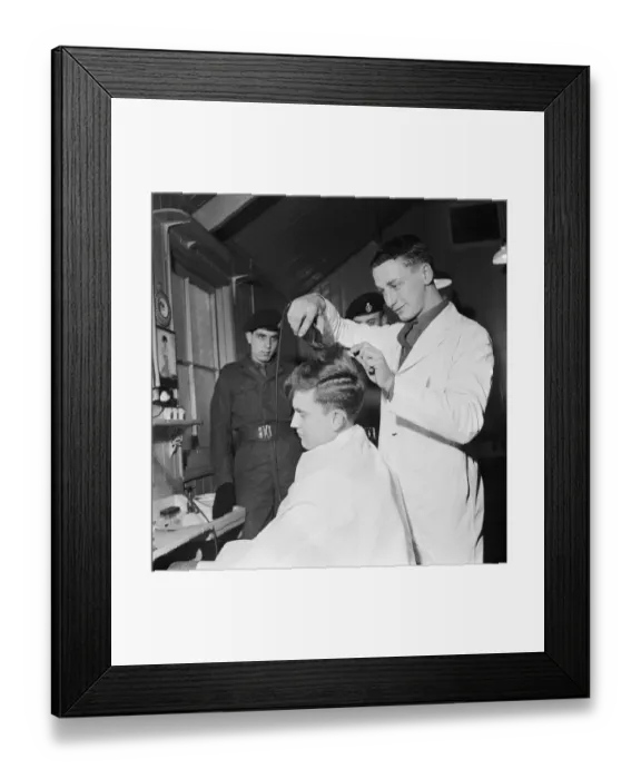 Framed Print : British pop singer Terry Dene gets a haircut from Rifleman G P Pennycook at Winchester Framed Print : British pop singer Terry Dene gets a haircut from Rifleman G P Pennycook at Winchester
