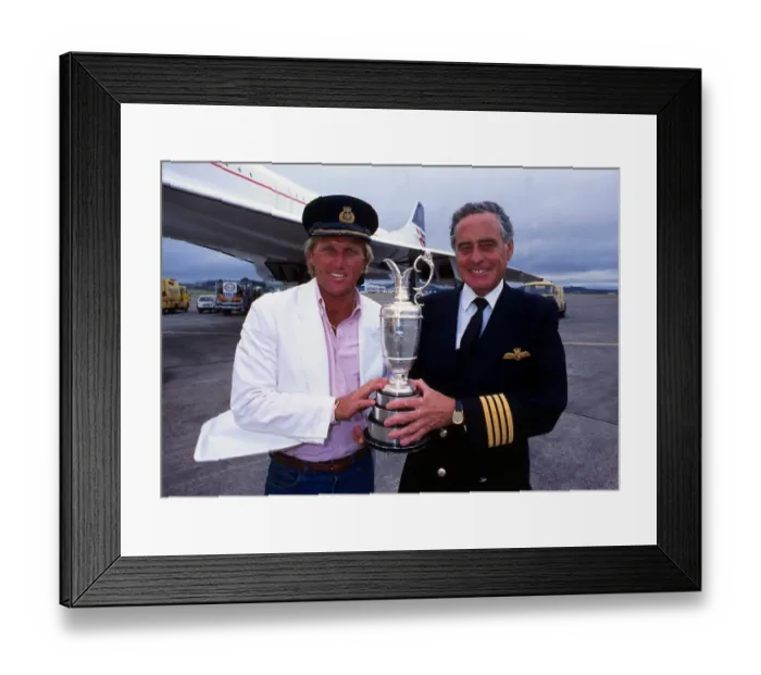 Framed Print : Greg Norman holds the Claret Jug trophy after winning the British Open with Concorde