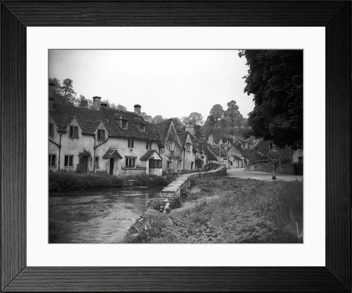 Framed Print : A country scene, Castle Combe in Wiltshire, 1943 A man strolls through a country Framed Print : A country scene, Castle Combe in Wiltshire, 1943 A man strolls through a country