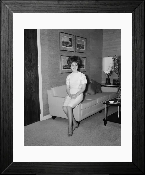 Framed Print : American pop singer Brenda Lee in her room at the Hilton Hotel in London