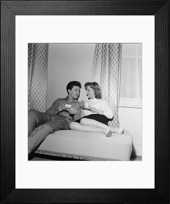 Framed Print : British pop singer Terry Dene re-united with his wife Edna Savage at her flat in
