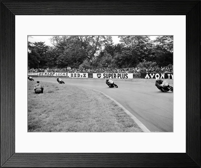 Framed Print : Motor Cycle Racing at oulton Park. A bunch of bikes at Old Hall corner during Framed Print : Motor Cycle Racing at oulton Park. A bunch of bikes at Old Hall corner during