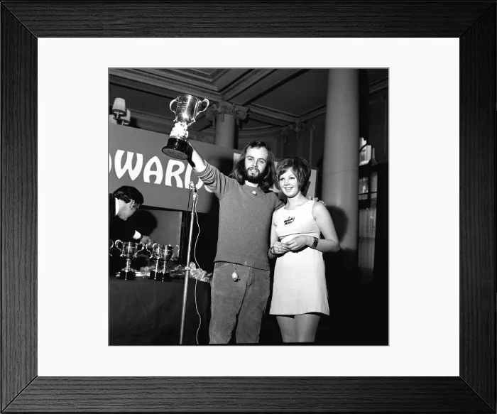 Framed Print : DJ John Peel receives Melody Maker music awards 1969 from a reader as best disc