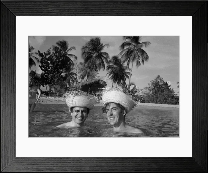 Framed Print : Peter Cook and Dudley Moore on holiday in Bahamas 1966 wearing straw hats inthe sea Framed Print : Peter Cook and Dudley Moore on holiday in Bahamas 1966 wearing straw hats inthe sea