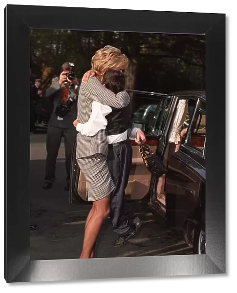 Princess Diana hugging Laurence Chambers who showed her around the Institute for