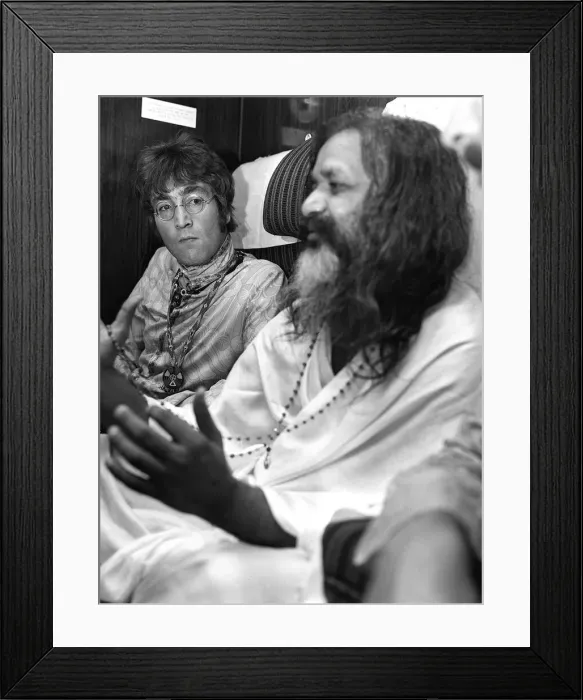 Framed Print : John Lennon and Mahirishi Yogi on the train going to Bangor, North Wales. 25 August 1967 Framed Print : John Lennon and Mahirishi Yogi on the train going to Bangor, North Wales. 25 August 1967