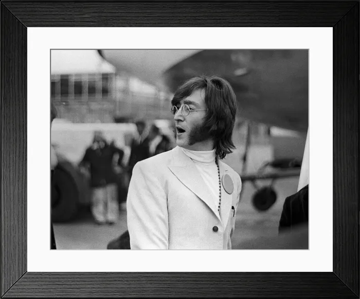 Framed Print : John Lennon at Heathrow Airport off to India, February 1968 Framed Print : John Lennon at Heathrow Airport off to India, February 1968