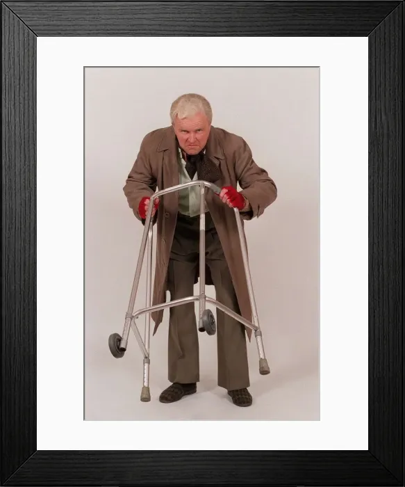 Framed Print : Clive Anderson TV Presenter is aged sixty years by a team of make up artists for the TV