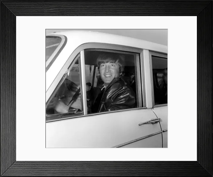 Framed Print : John Lennon pictured on his arrival back at London Airport, from the groups holidays Framed Print : John Lennon pictured on his arrival back at London Airport, from the groups holidays