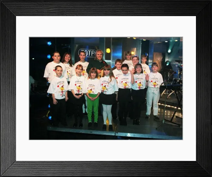 Framed Print : The Children of Dunblane pictured here performing their Charity record for Christmas with Framed Print : The Children of Dunblane pictured here performing their Charity record for Christmas with