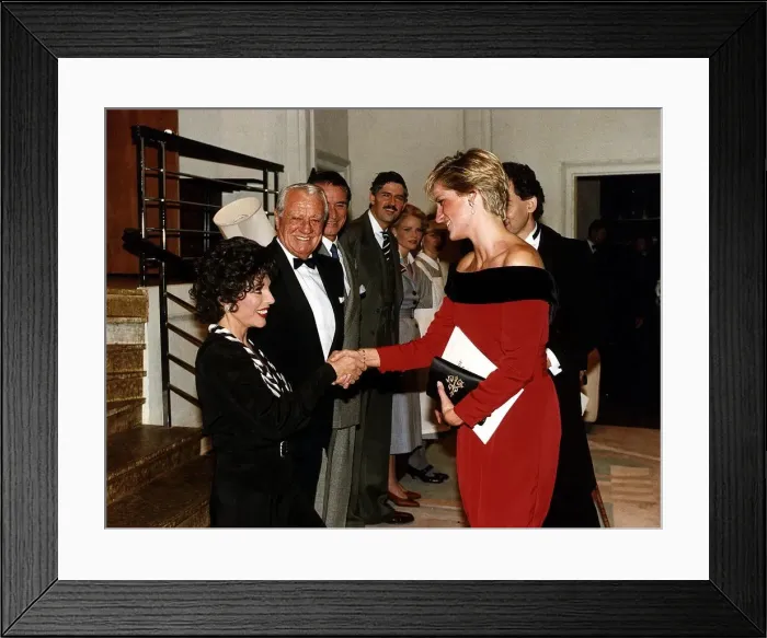 Framed Print : Princess Diana shakes hands with actress Joan Collins after a charity performance of Framed Print : Princess Diana shakes hands with actress Joan Collins after a charity performance of