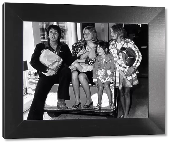Paul McCartney singer with The Beatles August 1974 with Linda McCartney