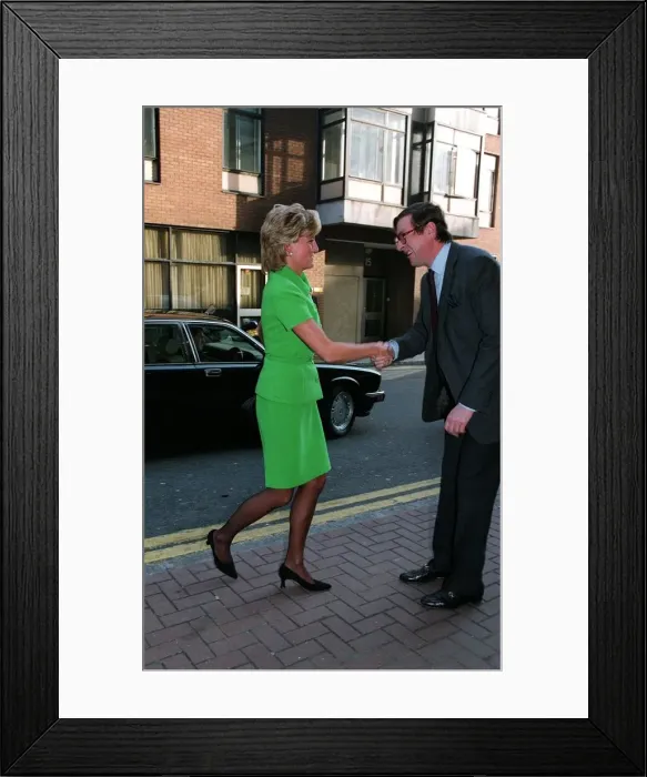 Framed Print : Diana, Princess of Wales is greeted by Max Hastings, Editor of the Evening Standard