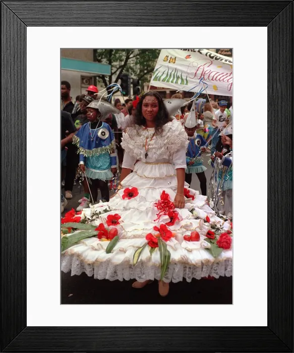 Framed Print : Notting Hill Carnival 1991 Men and women dress up in costumes during Framed Print : Notting Hill Carnival 1991 Men and women dress up in costumes during