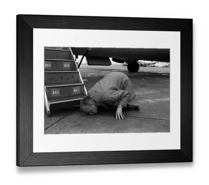 Framed Print : Hughie Green April 1963 Comedian TV Presenter kissing the ground at London Airport Framed Print : Hughie Green April 1963 Comedian TV Presenter kissing the ground at London Airport