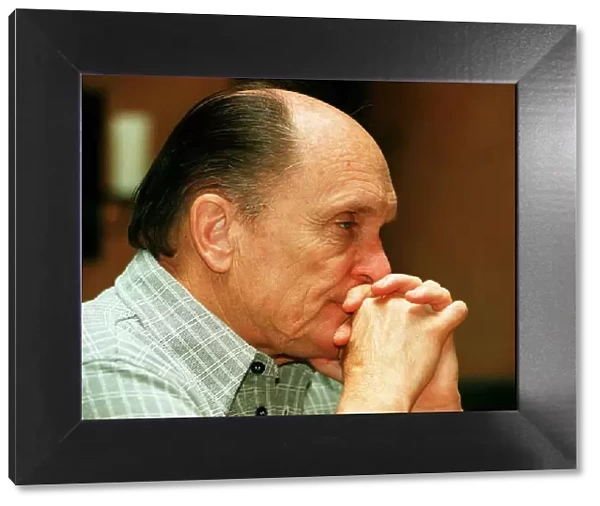 Actor Robert Duvall in Glasgow May 1998 hands clasped at face