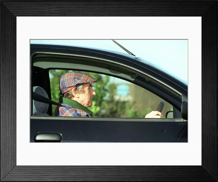 Framed Print : Jackie Stewart inside his Ford Ka car January 1998 Framed Print : Jackie Stewart inside his Ford Ka car January 1998