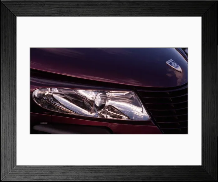Framed Print : Plymouth Prowler October 1998 Detail of headlamp bonnet badge logo maroon Framed Print : Plymouth Prowler October 1998 Detail of headlamp bonnet badge logo maroon