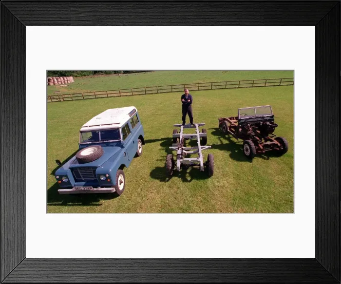 Framed Print : Paul Watson with Land Rovers July 1998 in stages of building Earlston Glenburnie Farm