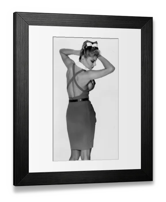 Framed Print : Jilly Johnson glamour model 1988 in backless dress showing breast has had implants