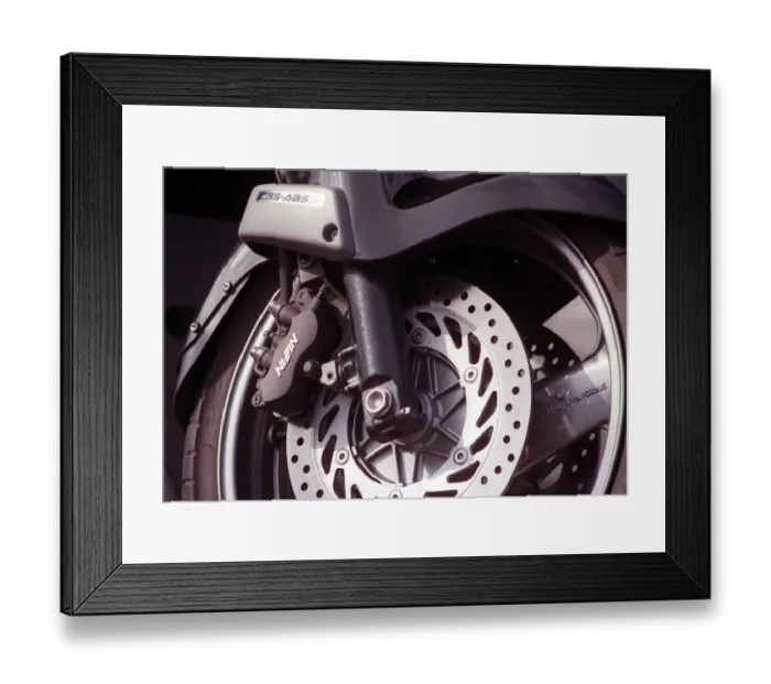 Framed Print : Honda Pan European motorcycle July 1998 Detail of suspension ventilated brake disc Framed Print : Honda Pan European motorcycle July 1998 Detail of suspension ventilated brake disc