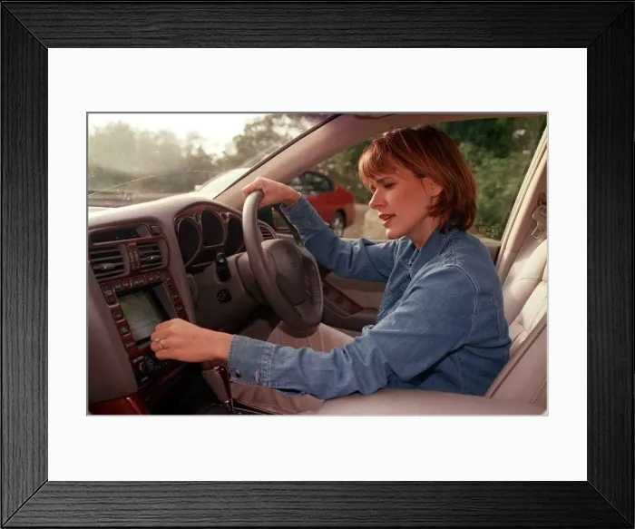 Framed Print : Carol Smillie tries out the computer navigation system in her Lexus car October 1998 Framed Print : Carol Smillie tries out the computer navigation system in her Lexus car October 1998