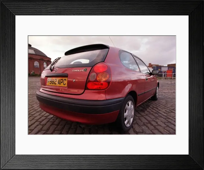Framed Print : Toyota Corolla Pictured from back November 1997 Red car Framed Print : Toyota Corolla Pictured from back November 1997 Red car