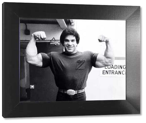 Lou Ferrigno Actor and Bodybuilder with arms up showing muscles March 1980
