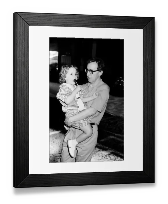 Framed Print : Woody Allen actor and film director with daughter at Heathrow Airport July