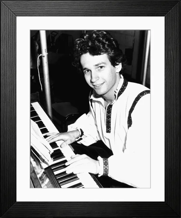 Framed Print : Harry Crosby actor and musician relaxes at piano Framed Print : Harry Crosby actor and musician relaxes at piano