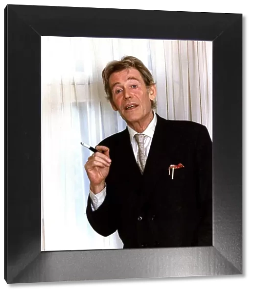 Peter O Toole actor smoking a cigarette in a cigarette holder December 1988