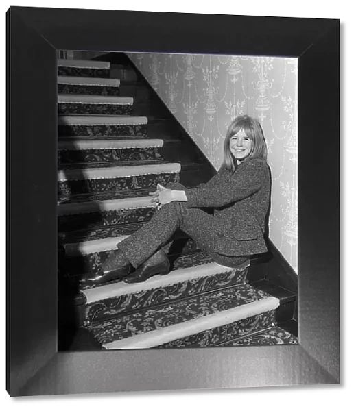 Marianne Faithfull singer and actress December 1964 Sitting on a staircase