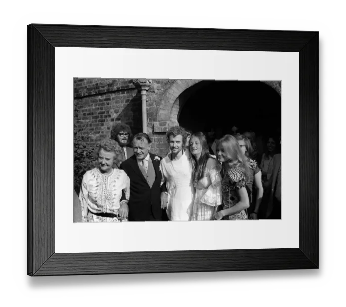 Framed Print : John Mills with his wife at the wedding of his son Jonathan to Christine Twaites