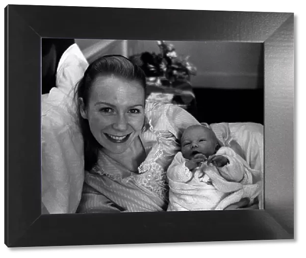 Juliet Mills pictured in hospital after the birth with her baby son Sean Ryan The