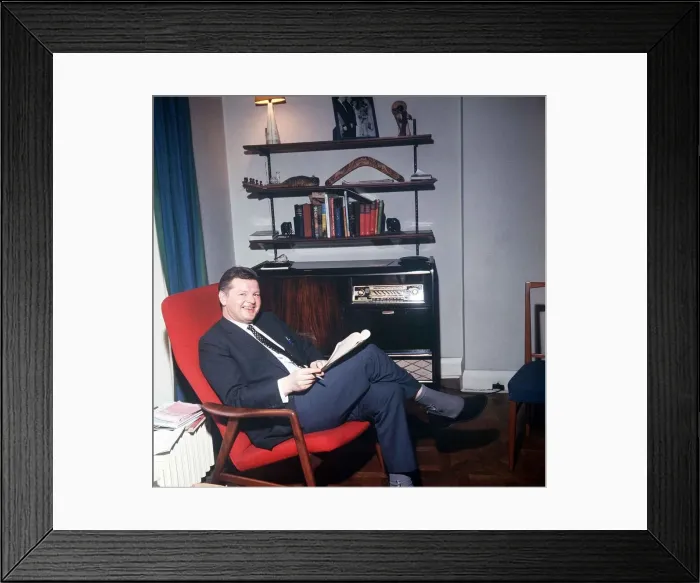 Framed Print : The comic actor Benny Hill in his Kensington flat February 1966 reading in Framed Print : The comic actor Benny Hill in his Kensington flat February 1966 reading in