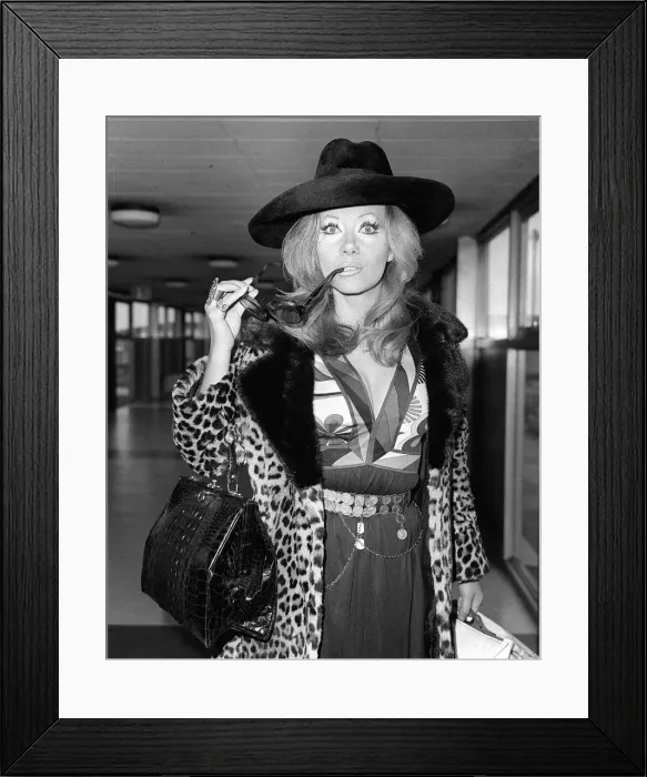 Framed Print : Ingrid Pitt arriving at Heathrow airport from Rome where she has had talks about her new Framed Print : Ingrid Pitt arriving at Heathrow airport from Rome where she has had talks about her new
