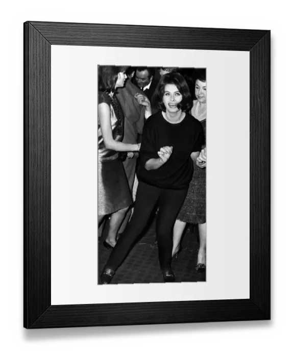 Framed Print : Sophia Loren the film actress dancing at a party