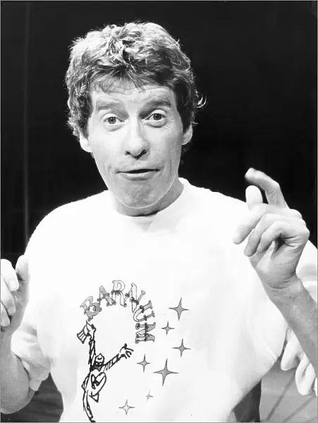 Michael Crawford actor and singer wearing a Barnum sweat shirt