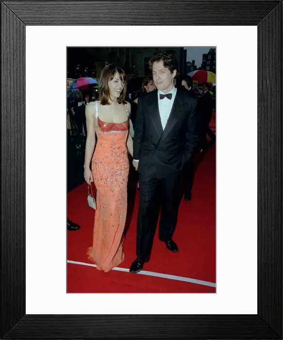 Framed Print : Hugh Grant Actor April 98 Arriving for the BAFT Aawards 1998 with girlfriend Liz