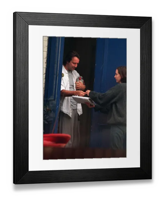 Framed Print : Neil Pearson takes the beer from mirror girl Polly Graham