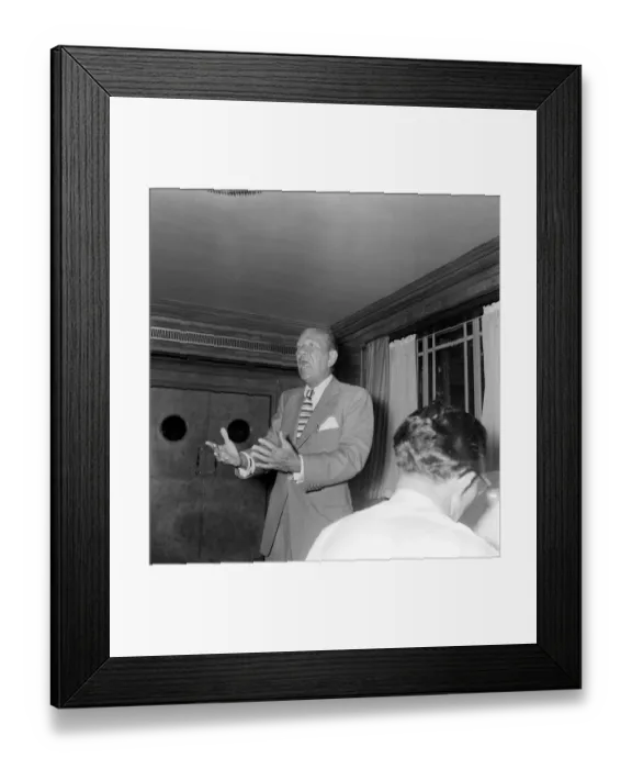 Framed Print : Noel Coward actor and playwright performing at the Dorchester Hotel London